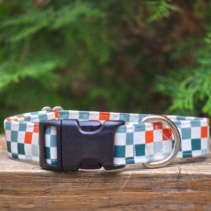 rust orange and green checkered fall dog collar. shown with black plastic buckle.
