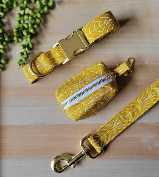art deco set in mustard yellow, dog collar, leash, and poop bag
