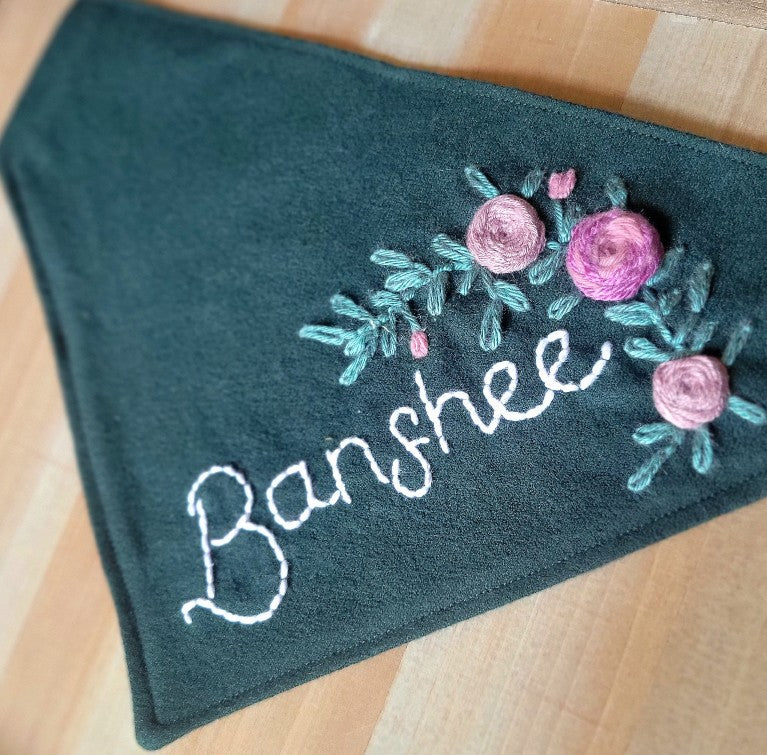 dark green dog bandana with hand embroidered florals and personalized with dogs name