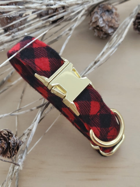 made for small dogs, this classic red and black buffalo plaid is a smaller pattern, ideal for small pups, shown with shiny gold metal hardware