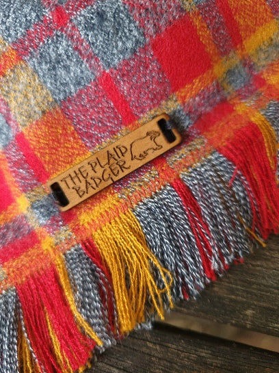 bright red and golden yellow plaid stripes on medium gray background, chiefs themed flannel dog bandana, handmade by the plaid badger