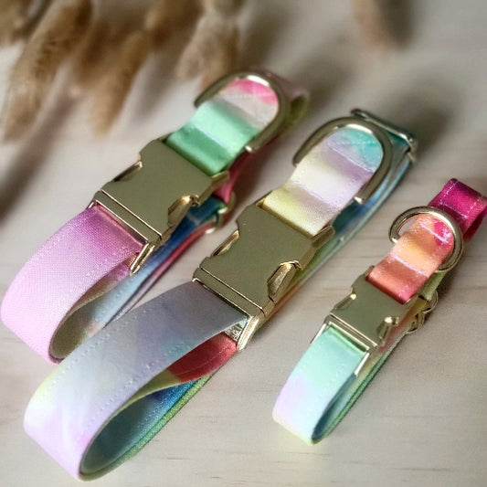 Bright pops of rainbow color pastels in a dreamy watercolor type effect. shown with gold metal hardware