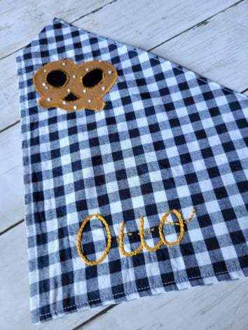 our classic oktoberfest dog bandana customized with your pets name in mustard yellow