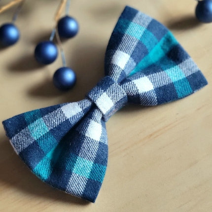 navy blue, turquoise, and white plaid gingham dog bow tie. made with soft cotton flannel, (not shown), elastics on backside for sliding over the collar