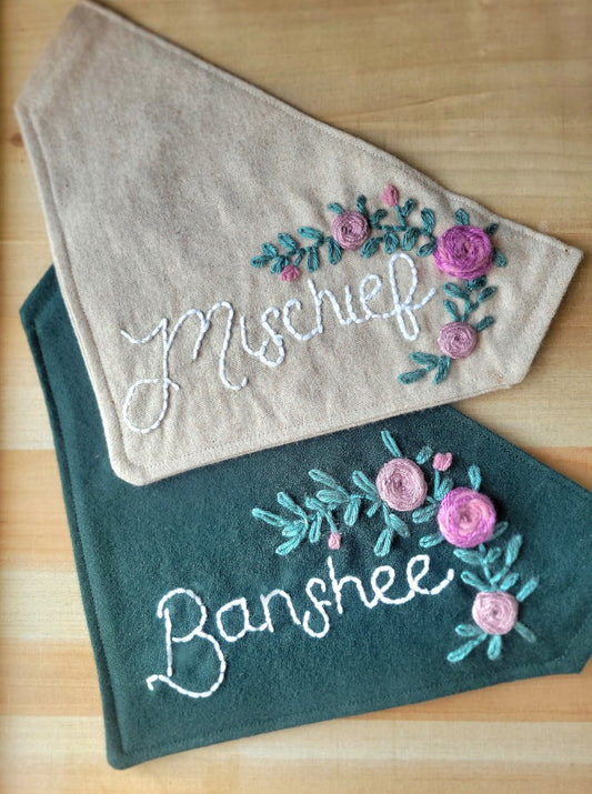floral dog bandana, personalized with hand embroidered name and roses, over the collar
